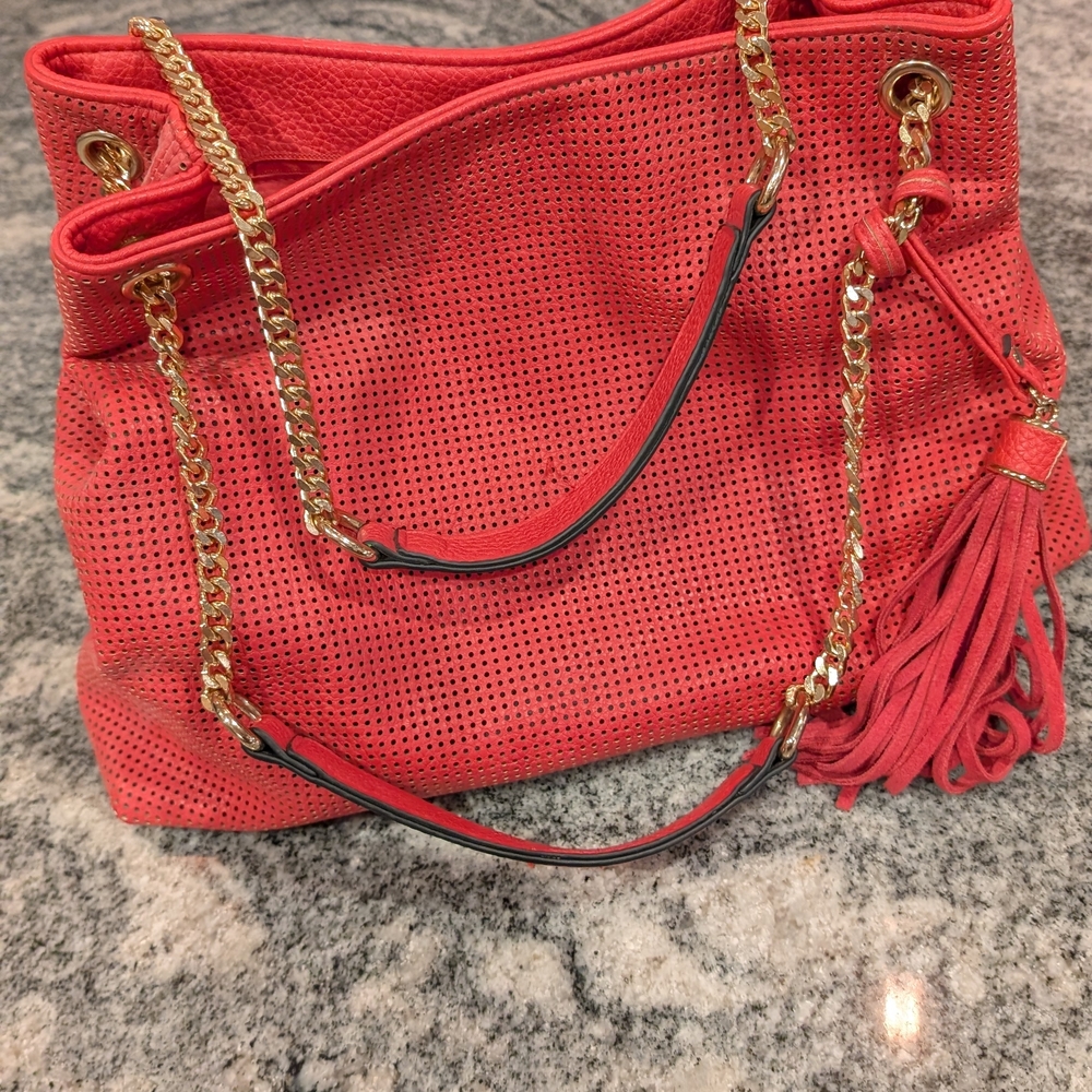 Bright pink and gold bag